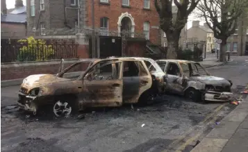  ??  ?? WANTON VANDALISM: Burnt out cars in Dublin’s North Inner City last weekend