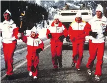  ?? KING FAMILY ?? A family from the Cranbrook area, left, David King, centre, Frank King, second from right, and Steve King with the Olympic torch.