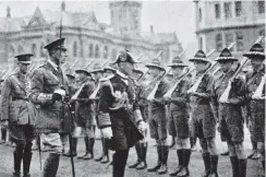  ?? COPIES OF PICTURE AVAILABLE FROM ODT FRONT OFFICE, LOWER STUART ST, OR WWW.OTAGOIMAGE­S.CO.NZ ?? His Excellency the GovernorGe­neral Viscount Jellicoe inspects the guard of honour on his arrival at Dunedin Railway Station. — Otago Witness, 23.11.1920.