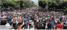  ?? PHOTO: ANITA BACA/AP ?? FEARFUL: Workers and residents in Mexico City take to the streets after yesterday’s earthquake.