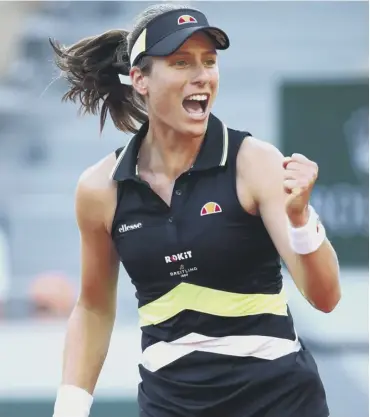  ??  ?? 0 Johanna Konta celebrates as she completes her 6- 2, 6- 1 victory over Viktoria Kuzmova yesterday.