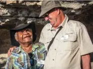  ??  ?? Local elder Danny Gordon (at left) and Coral Expedition­er David Fowler share a bonding moment at the Yindayin art site on Stanley Island.