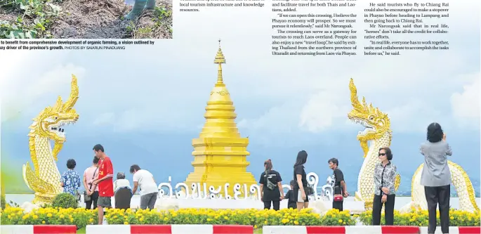  ??  ?? Visitors admire a garden entrance to Kwan Phayao, the biggest freshwater lake in North Thailand.