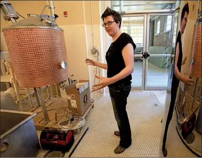  ?? Arkansas Democrat-Gazette/STATON BREIDENTHA­L ?? Rose Cranson hopes to fire up her still soon at the Superior Bathhouse Brewery and Distillery in Hot Springs. She is in the final stages of obtaining state and federal permits to distill spirits.