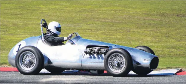  ?? PHOTOS: RON VEINT ?? Paul Coghill, of Dunedin, completed a clean sweep in the Vintage Racing Car Class in his Jaguar Special at the Mobil 1 Classic SpeedFest at Teretonga Park in Invercargi­ll. Below: Scott O’Donnell, of Invercargi­ll, won two Historic Touring Car Races.