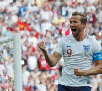  ?? ANTONIO CALANNI — THE ASSOCIATED PRESS ?? England’s Harry Kane celebrates after he scored his side’s second goal during the group G match between England and Panama at the 2018 soccer World Cup at the Nizhny Novgorod Stadium in Nizhny Novgorod, Russia, Sunday.