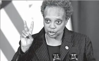  ?? TERRENCE ANTONIO JAMES/CHICAGO TRIBUNE ?? Chicago Mayor Lori Lightfoot speaks during a news conference at City Hall on Dec. 17. She said the city will no longer withhold a video from residents seeking police records of their own incidents.