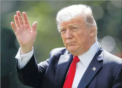  ?? AP PHOTO ?? President Donald Trump waves as he walks from the Oval Office of the White House in Washington, Friday, to Marine One for the short trip to Andrews Air Force Base, Md. Trump on Sunday mocked the leader of nuclear-armed North Korea as “Rocket Man” while...