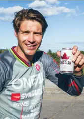  ??  ?? left
The most decorated DH rider in history, Greg Minnaar, enjoys a cold one after finals in Mont-sainte-anne