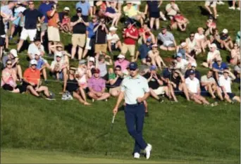  ?? JOHN WOIKE — HARTFORD COURANT VIA AP ?? Jordan Spieth pumps his fist after making a birdie putt for sole possession of the lead during the third round of the Travelers Championsh­ip Saturday in Cromwell, Conn.