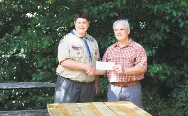  ?? Contribute­d photo ?? Flanders Nature Center &amp; Land Trust recently took delivery of four picnic tables from Charlie Stock, of Boy Scout Troop 54 in Woodbury. The tables were constructe­d as part of his Eagle Scout project.