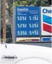  ?? RICH PEDRONCELL­I/AP ?? Chevron gas prices are over the $5 mark in Visalia, California, on Tuesday.