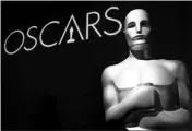  ?? ASSOCIATED PRESS FILE PHOTO ?? OSCAR GOES SOLO FOR THE FIRST TIME as the motion picture academy has announced that this year’s Oscars ceremony will be without a host.