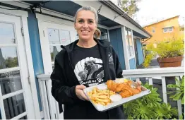  ?? JOSE CARLOS FAJARDO/STAFF ?? Fish and chips make a great post-Bay Trail meal at the Sardine Can, where manager Angela Smith holds court.