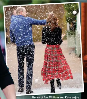  ??  ?? Flurry of fun: William and Kate enjoy themselves amid the fake snow yesterday