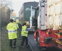  ??  ?? Stop checks are carried out on vehicles.