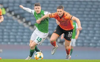  ??  ?? Kevin Nisbet in a race with United’s Ryan Edwards