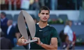  ?? ?? Carlos Alcaraz with the trophy after winning the Madrid Open. Photograph: Oscar Gonzalez/NurPhoto/Shuttersto­ck