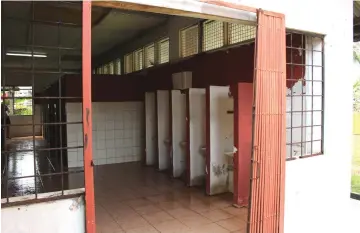  ??  ?? The boys’ toilet at SMK Sungai Tapang also lacks privacy in terms of its design.