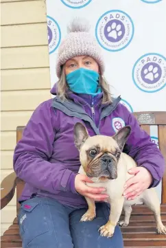  ??  ?? Resident PADS Forteviot kennel manager Jo High with French bulldog Indie, one of only five dogs currently staying over