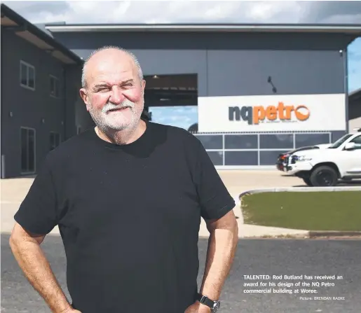  ?? Picture: BRENDAN RADKE ?? TALENTED: Rod Butland has received an award for his design of the NQ Petro commercial building at Woree.