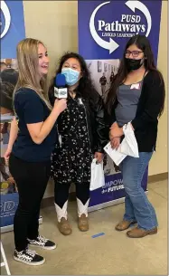  ?? RECORDER PHOTO BY CHARLES WHISNAND ?? Monache’s Multimedia Technology Academy student Alexis Ozuna interviews Carl Smith Middle School sixth graders Arani Garcia and Clarissa Valdez, right, during PUSD’S Pathways Expo on Thursday.