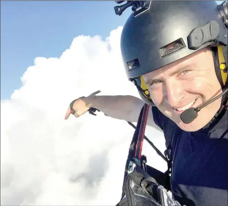  ?? Courtesy photo ?? Jeff O’Brien of Prairie Grove takes his 101st paraglidin­g flight. He is pictured 7,000 feet high over western Washington County.