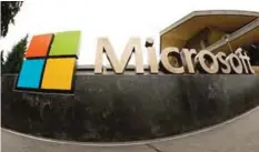  ??  ?? REDMOND: This July 3, 2014, file photo, shows the Microsoft Corp. logo outside the Microsoft Visitor Center. —AP