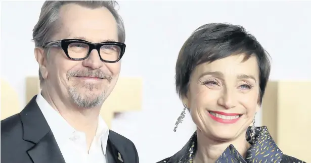  ??  ?? > Gary Oldman and Kristin Scott Thomas, pictured at the Darkest Hour premiere, have both been nominated for a Bafta