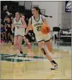  ?? JOY HANO — CAL POLY HUMBOLDT ?? Humboldt’s Jayci Bayne dribbles up the court against San Bernardino. The ‘Jacks were officially eliminated from postseason contention in the 6956loss on Thursday.