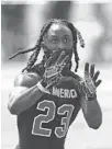  ?? JOHN MCCALL/SOUTH FLORIDA SUN SENTINEL ?? American Heritage defensive back Jacolby Spells catches a pass during the Under Armour All-America Camp Series in Miami on Sunday.