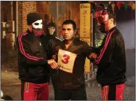  ??  ?? Gabriel Chavarria stars as Miguel, a Marine who returns home on Purge Night to help his sister. The Purge premieres at 9 p.m. today on USA Network and Syfy.