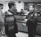  ?? Steve Gonzales / Staff photograph­er ?? Harris County Sheriff Ed Gonzalez, shown talking to a defendant on a new cite-and-release docket, was mentioned on “Last Week Tonight.”