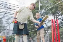  ?? PHIL CARPENTER/MONTREAL GAZETTE ?? Angus Bell, centre, gives tips to his son Logan as his other son Caelan helps in Montreal on Wednesday.