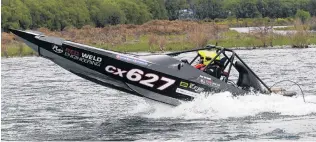  ?? PHOTOS: STEPHEN JAQUIERY ?? All fired up . .
. Tom Kelly charges along the Waitaki River yesterday.