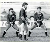  ??  ?? Left, Bill Bush leads the haka for NZ Ma¯ori in 1982; right, he watches as Tane Norton battles for the loose ball during an All Blacks test against Australia in the wet in 1974.