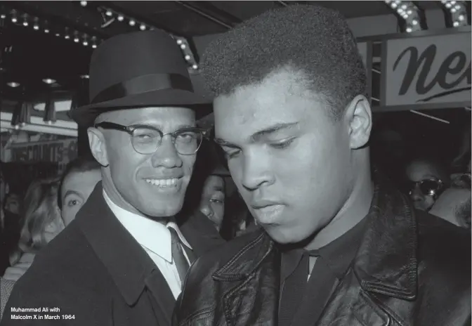  ??  ?? Muhammad Ali with Malcolm X in March 1964