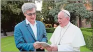  ?? FOCUS FEATURES VIA AP ?? Pope Francis, right, with director Wim Wenders during the filming of the documentar­y “Pope Francis: A Man Of His Word.”