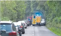  ??  ?? An ambulance en route to the A862 accident