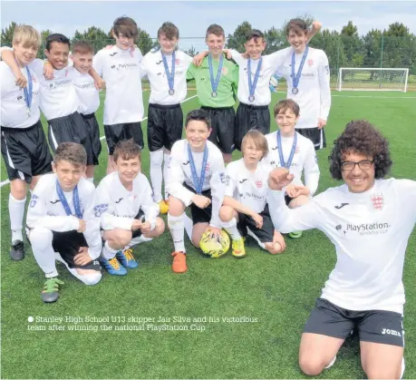  ??  ?? Stanley High School U13 skipper Jair Silva and his victorious team after winning the national PlayStatio­n Cup