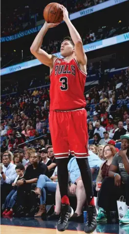  ?? | LAYNE MURDOCH JR./ GETTY IMAGES ?? With Mike Dunleavy and Jose Calderon traded, the Bulls will be relying heavily on Doug McDermott’s long- range shooting.