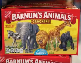  ?? Associated Press ?? ■ A box of Nabisco Barnum’s Animals crackers is displayed on the shelf of a local grocery store in Des Moines, Iowa. Mondelez Internatio­nal says it has redesigned the packaging of its Barnum’s Animals crackers after relenting to pressure from People for the Ethical Treatment of Animals.