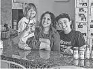  ?? JACOB WALSH ?? Founder of Luna Cooperativ­e, Jess Bird (center), with son Sawyer and partner Sarina Kari.