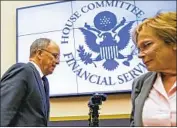  ?? SAMUEL CORUM Getty Images ?? FORMER Wells Fargo directors James Quigley and Betsy Duke attend a House committee hearing.