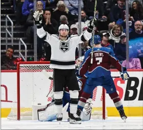  ?? ANDY CROSS — THE DENVER POST ?? DENVER, CO — MARCH 09: Los Angeles Kings right wing Adrian Kempe (9) celebrates his goal against Colorado Avalanche goaltender Alexandar Georgiev (40) in the third period at Ball Arena March 09, 2023. Colorado Avalanche defenseman Devon Toews (7) skates towards Georgiev.