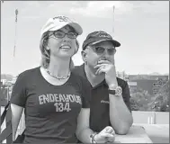  ?? AP Photo/southwest Photo Bank, P.K. Weis ?? Former U.S. Rep. Gabrielle Giffords and her husband, former astronaut Mark Kelly, watch the space shuttle Endeavor on Thursday fly over Tucson, Ariz., on its way to Los Angeles. Kelly, Endeavour’s last commander, requested that the shuttle pass over...