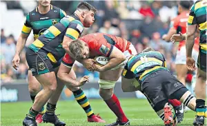  ??  ?? All-rounder: Besides his scrummagin­g and line-out skills, George Kruis (in red) is ‘unbelievab­le round the park,’ says Saracens coach Mark McCall