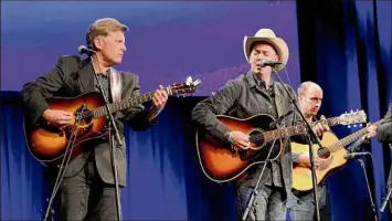  ?? Jason Kempin / Getty Images ?? Eric Gibson, left, and Leigh Gibson of The Gibson Brothers will perform at the Caroga Lake Music Festival on July 19.