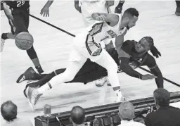  ?? MICHAEL CHOW/THE REPUBLIC ?? Suns forward Jae Crowder strips the ball from Pelicans guard CJ McCollum (3) during Game 2 of their first-round Western Conference playoff series in Phoenix on Tuesday night.