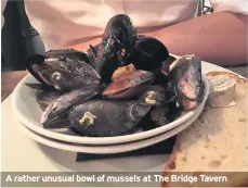  ??  ?? A rather unusual bowl of mussels at The Bridge Tavern